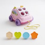 Pull Along Shape Sorting Car Toy for Toddlers 1+ Year | Educational Shape Sorter Vehicle with 4 Textured Shape Blocks & Storage Compartment | Montessori Learning Toy (Pink)